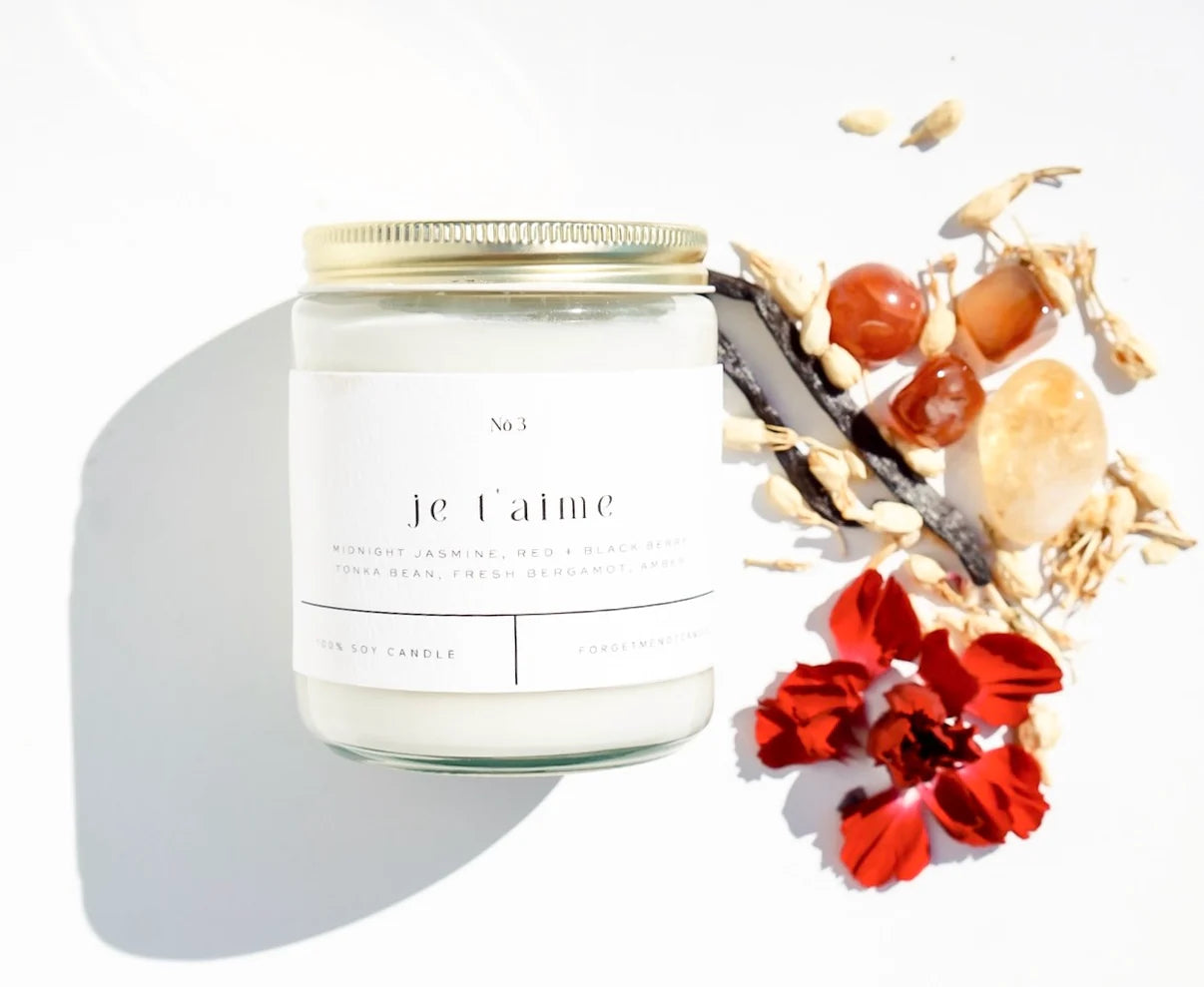 Je T'Aime 100% Soy Candle in a chic glass jar with a romantic floral aroma