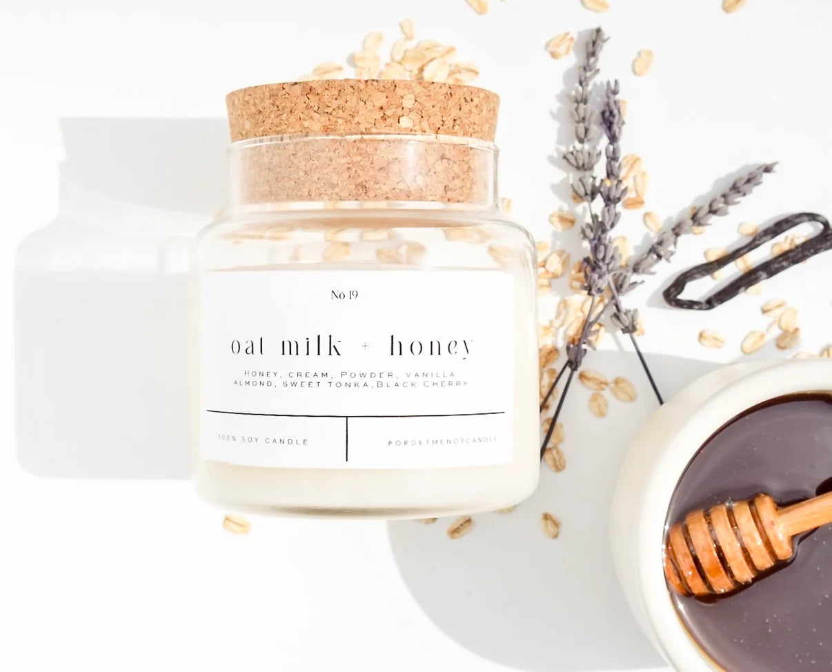 Oat Milk and Honey 100% Soy Candle in a sleek jar with cozy sweet fragrance notes