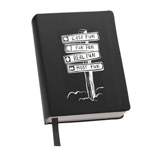 Lined journal with vibrant ski signs design on the cover, perfect for adventurers